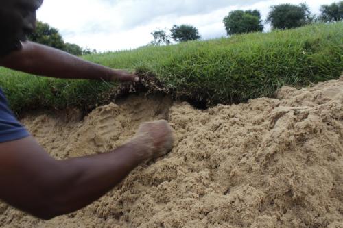 Bunker-Armour-being-installed-under-the-sod